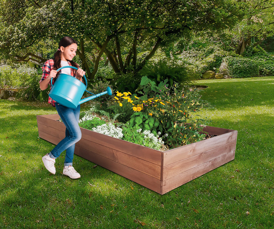 "Geniet van het water geven in de zon met deze plantenbak voor buiten."