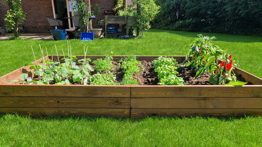 "Ideaal voor het kweken van fruit, groenten, kruiden en bloemen, deze moestuinbak voor buiten."