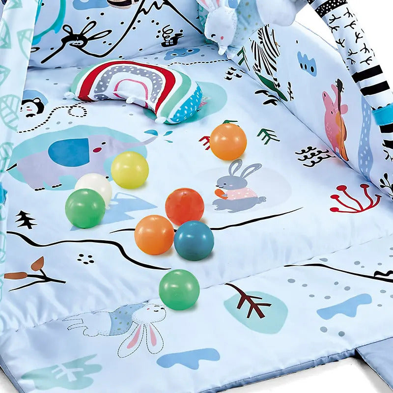 "Blauw speelkleed voor baby's met boog, konijnmotief, inclusief ballen en kussentje."